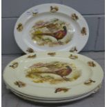 Five large serving plates decorated with birds **PLEASE NOTE THIS LOT IS NOT ELIGIBLE FOR POSTING