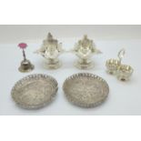 White metal items; a small bell marked 800, a miniature dish with handle marked 800, two filigree