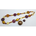 A Murano glass necklace with 9ct gold fastener and two 9ct gold mounted pendants