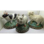 Three Staffordshire style china figures of farm animals, cow 25cm long