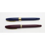 A Sheaffer blue fountain pen with 14ct gold nib and a Sheaffer burgundy fountain pen, stamped '