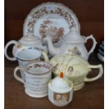 Three commemorative teapots including a WWII War Against Hitlerism 1939 teapot, an 1839 mug and