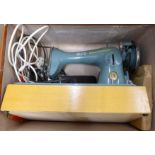 An Alpha Challenge sewing machine with case **PLEASE NOTE THIS LOT IS NOT ELIGIBLE FOR POSTING AND