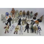 A collection of Star Wars character figures