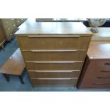 A teak chest of drawers