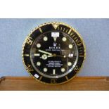 A Rolex dealers display style wall clock