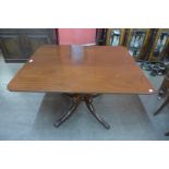 A George IV mahogany rectangular dining table