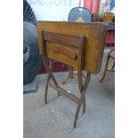 A Victorian mahogany folding coaching table