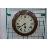 A small Victorian walnut circular wall clock