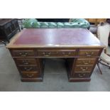 A Victorian mahogany pedestal desk