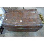 A tin steamer trunk