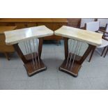 A pair of Art Deco style simulated rosewood and faux marble topped console tables