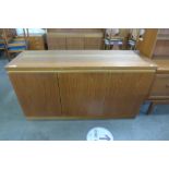 A Danish Skovby teak three door sideboard