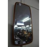 A teak framed mirror