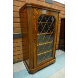 A Victorian inlaid walnut single door side cabinet