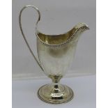 A George III silver cream jug, London 1784, 107g
