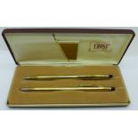 A Cross pen and propelling pencil set, 1/20 10K rolled gold, boxed