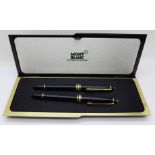 A Mont Blanc Meisterstuck fountain pen with 14ct gold nib, ED2302437, and rollerball pen set, the