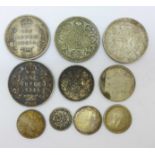 Indian silver coins, four one rupee coins, 1905, 1906, 1941 and 1942, and six other Indian coins,