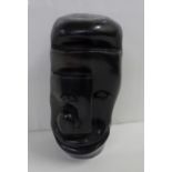 A West African carved modernist bust, Gabon, 25.5cm