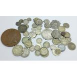 A collection of coins, including United States 1892 half dollar, 1904 quarter dollar, 1899 one dime,
