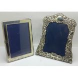 Two silver photograph frames, height of shaped frame 18.5cm