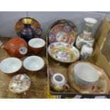 Chinese and Japanese vases, bowls, two teapots, etc., including cloisonne