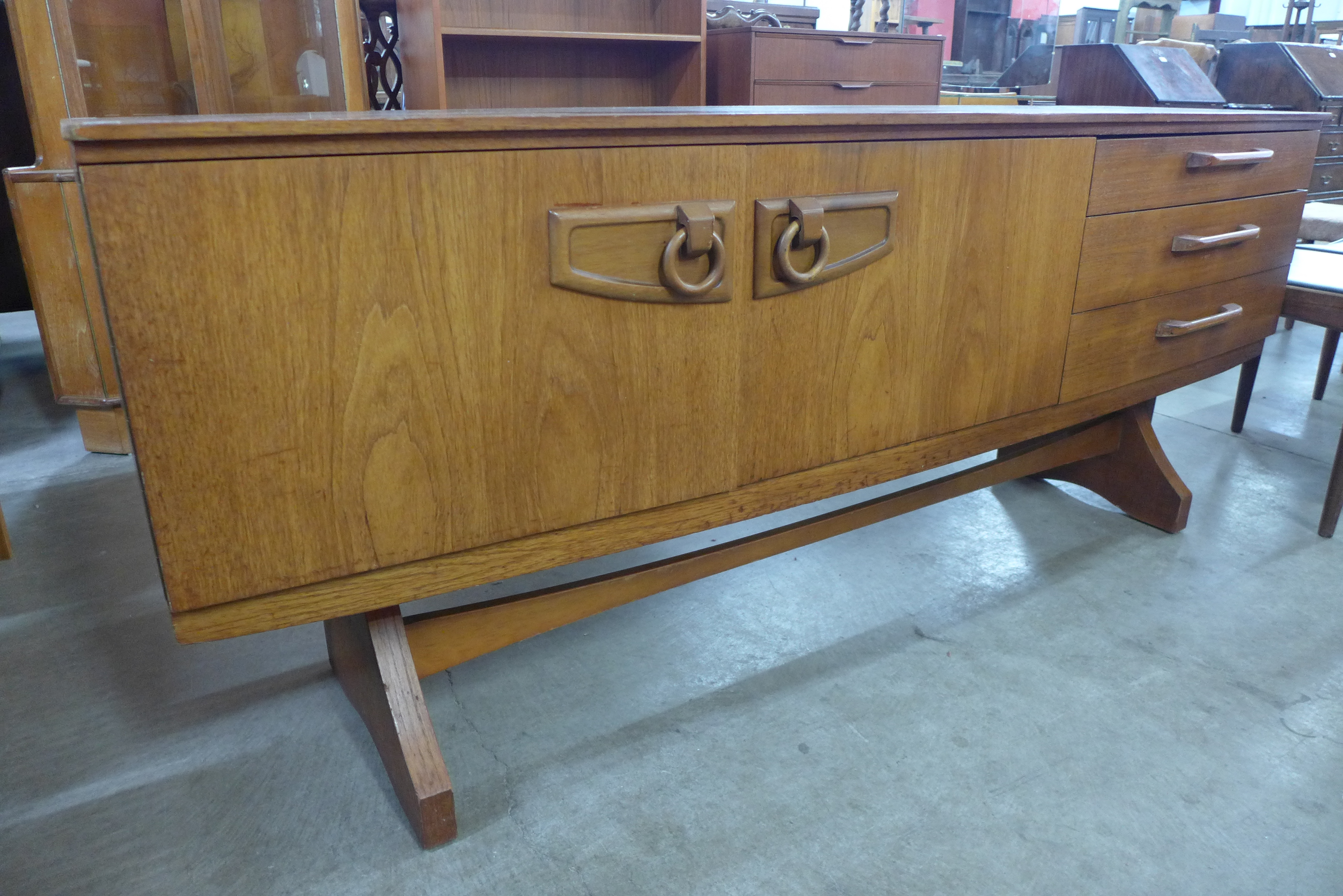 A Beautility teak sideboard