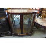 A walnut display cabinet