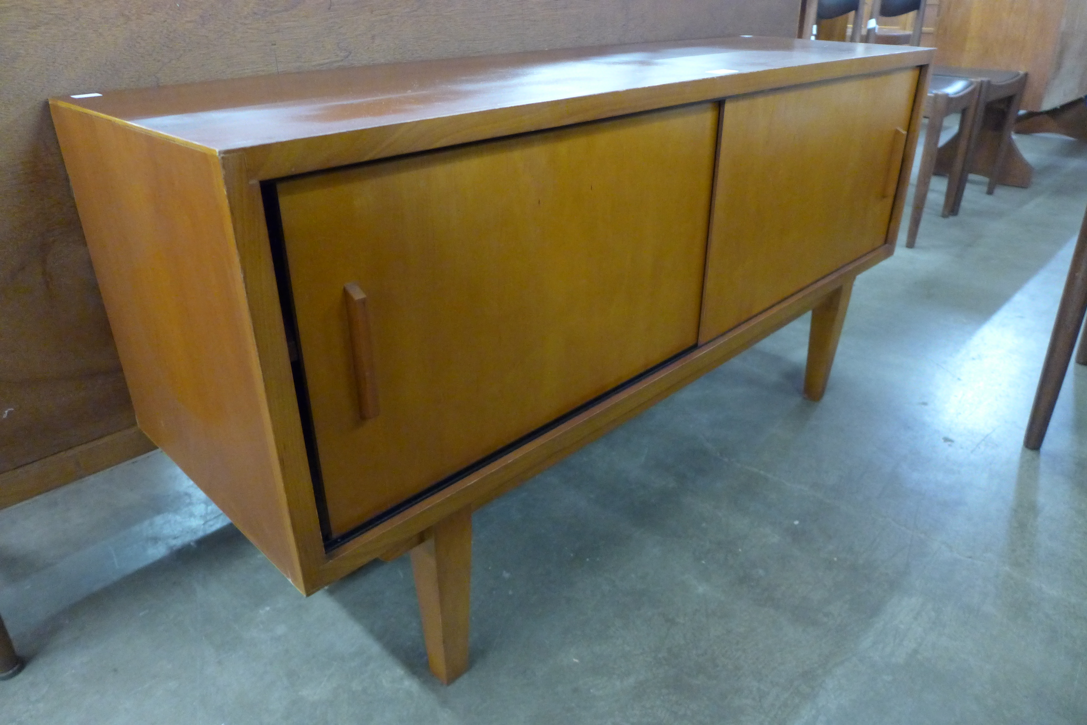 A small teak sideboard