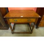 A George II oak single drawer side table