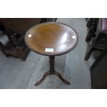 An Edward VII mahogany tripod wine table