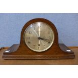 An oak mantel clock