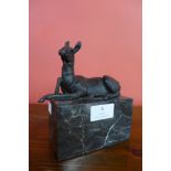 A small French style bronze figure of a deer, on black marble socle