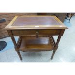 A small 19th Century French walnut writing table