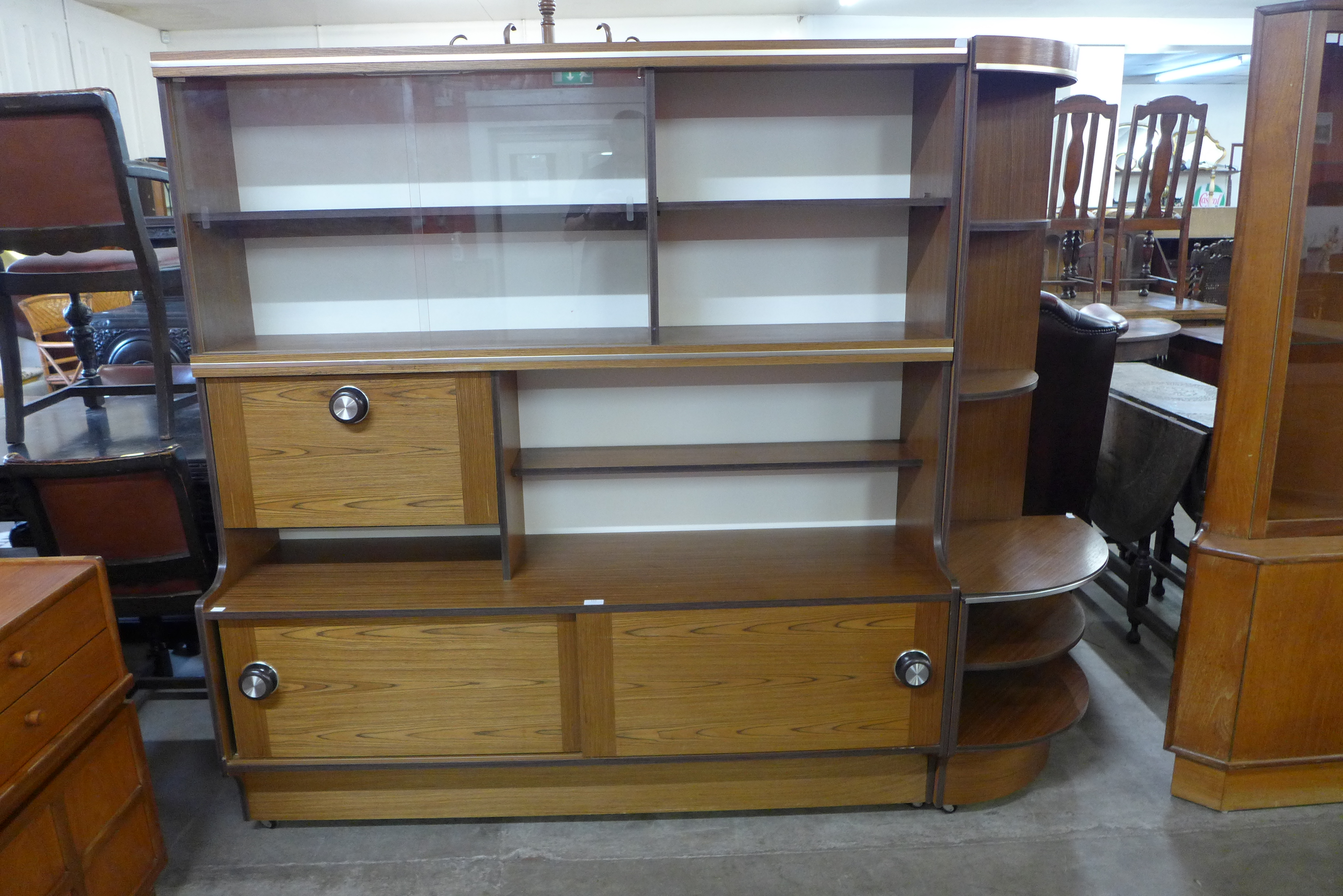 A Stateroom teak room divider and matching corner cabinet