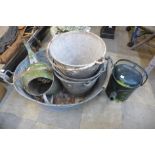 A galvanised tub, buckets and watering cans