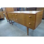 A teak and afromosia sideboard