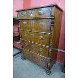 A late 19th Century French pitch pine chest of drawers