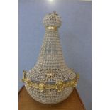 A French Empire style gilt metal and glass bag shaped chandelier