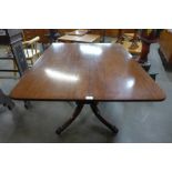 A George IV mahogany rectangular dining table