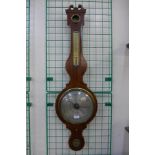 A George III inlaid mahogany banjo barometer