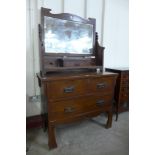 An Arts and Crafts oak dressing table, attributed to Liberty & Co., London