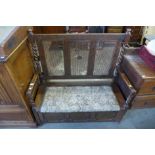 An oak barleytwist bergere hall seat, a/f