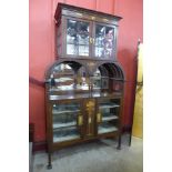 An Art Nouveau inlaid mahogany side cabinet, 207cms h, 122cms w, 41cms d