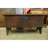 A small 17th Century oak six plank coffer