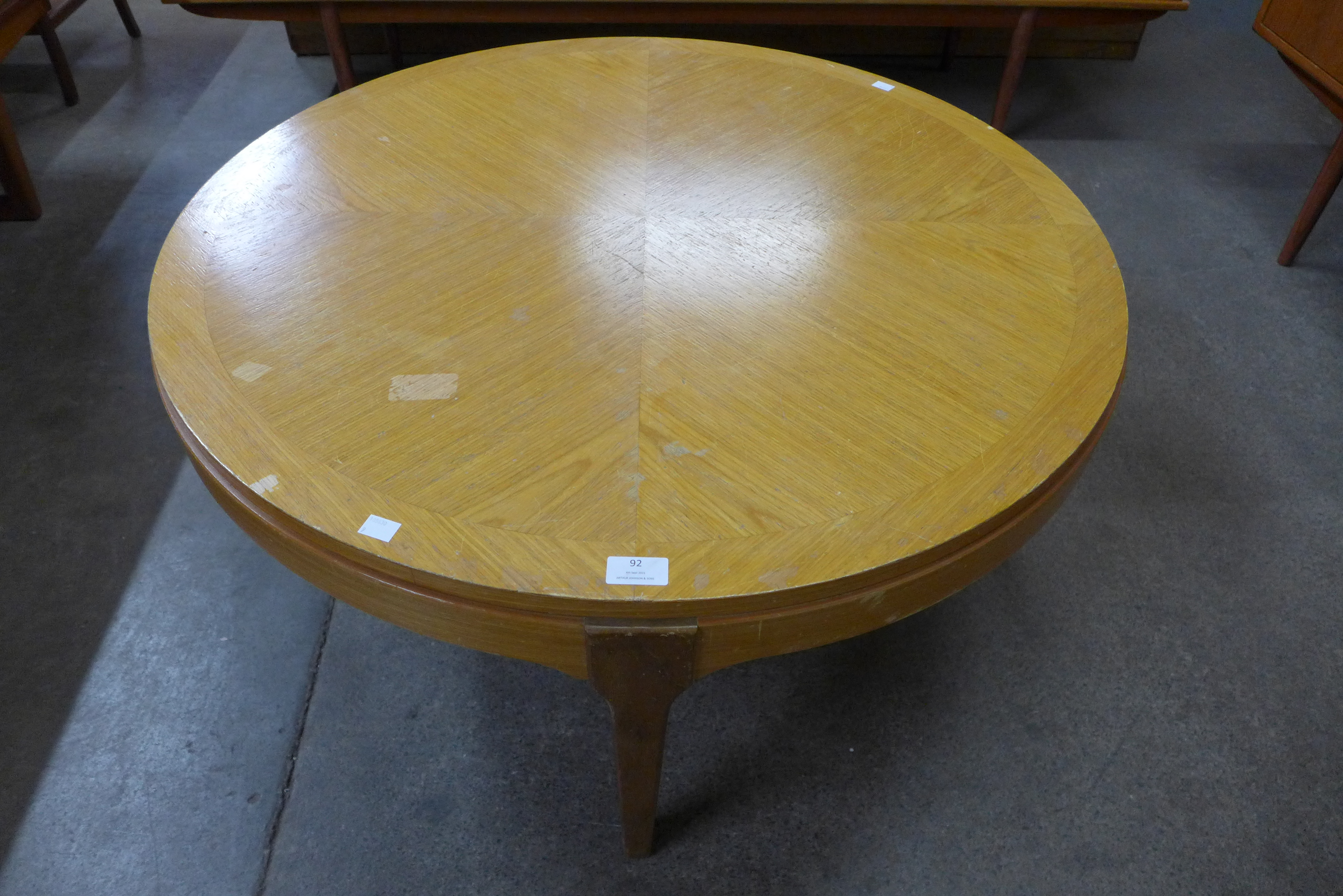A Stateroom teak circular coffee table