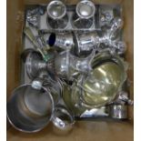 A collection of silver plated items including napkin rings, jug, candle sticks, salt, etc. **