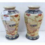 A pair of Chinese vases **PLEASE NOTE THIS LOT IS NOT ELIGIBLE FOR POSTING AND PACKING**