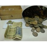 A collection of coins including a tin of pennies and 1902 two shillings, silver three pence, 1/4